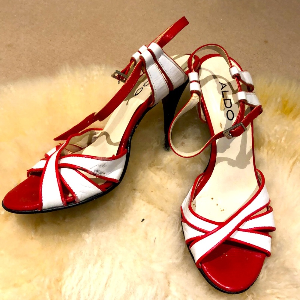 Also red and white carnival heels. Size 6.